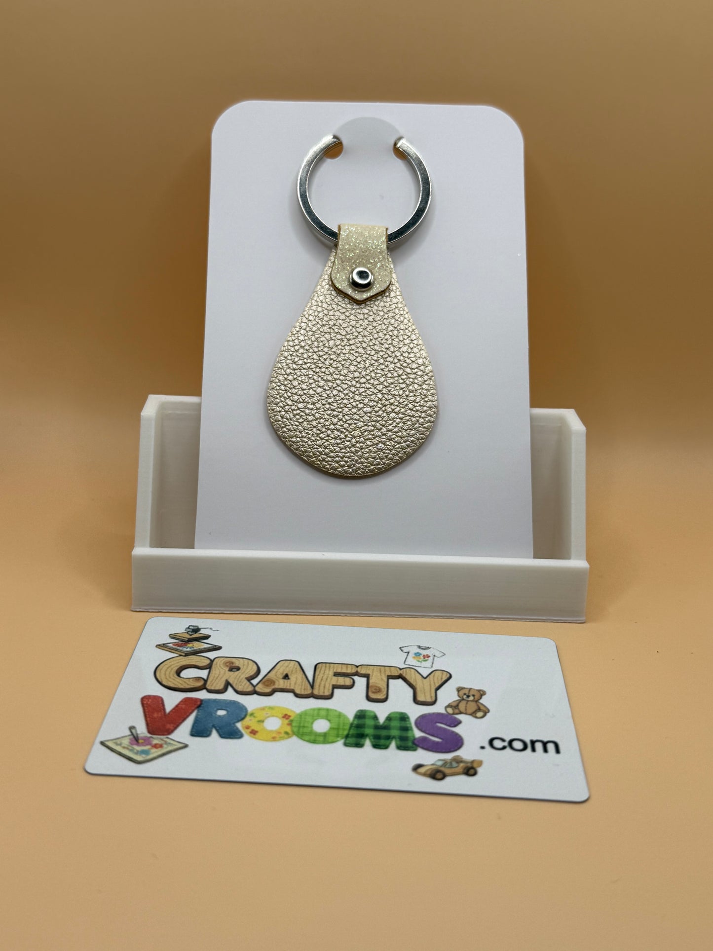 Leatherette keyholder - crow/book