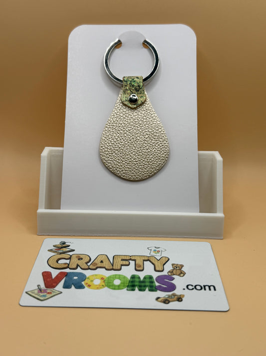 Leatherette keyholder - gold gllitter