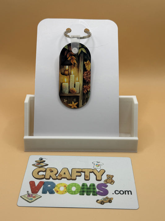 Oval keychain - Dark Academia candle lit books