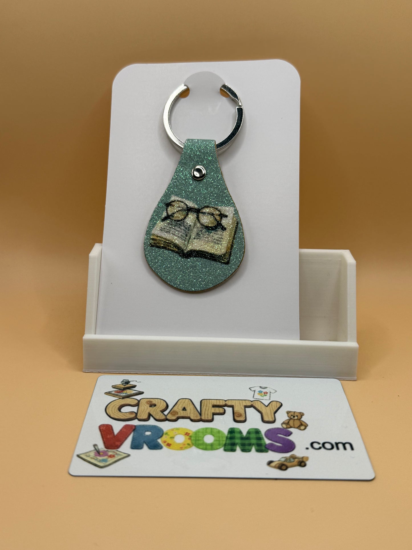 Leatherette keyholder - teal reader