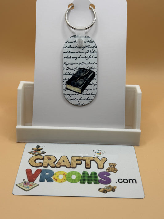 Oval keychain - Dark Academia Journal