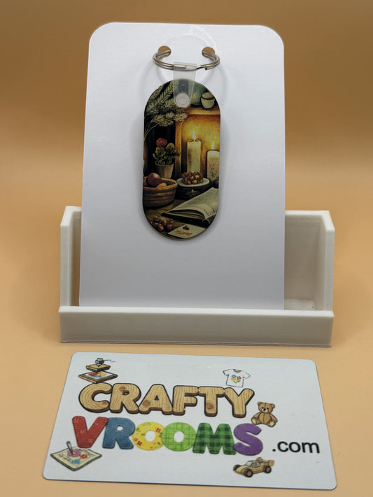 Oval keychain - Dark Academia candle lit books