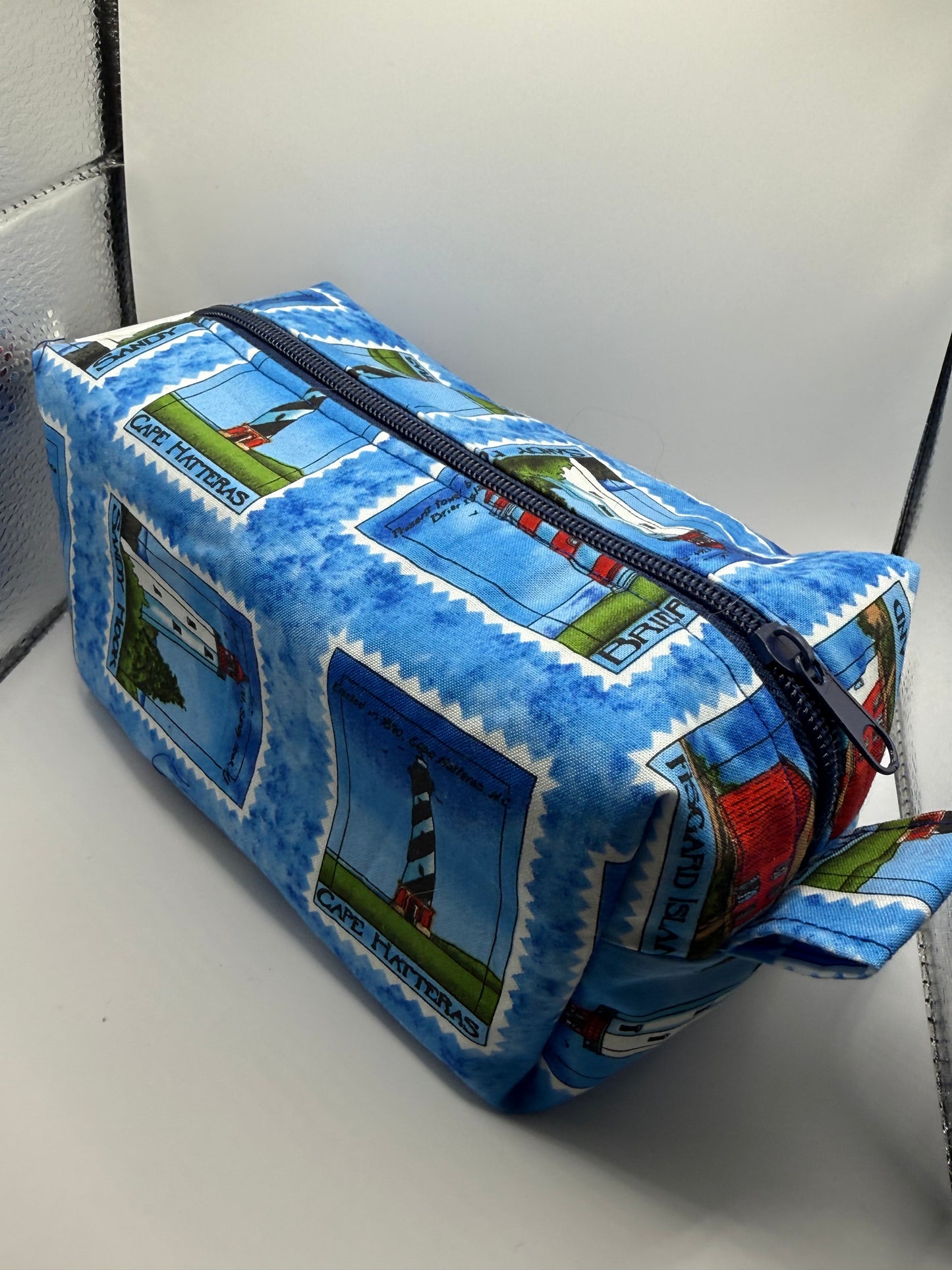 Medium sized travel cosmetic bag - Blue lighthouse